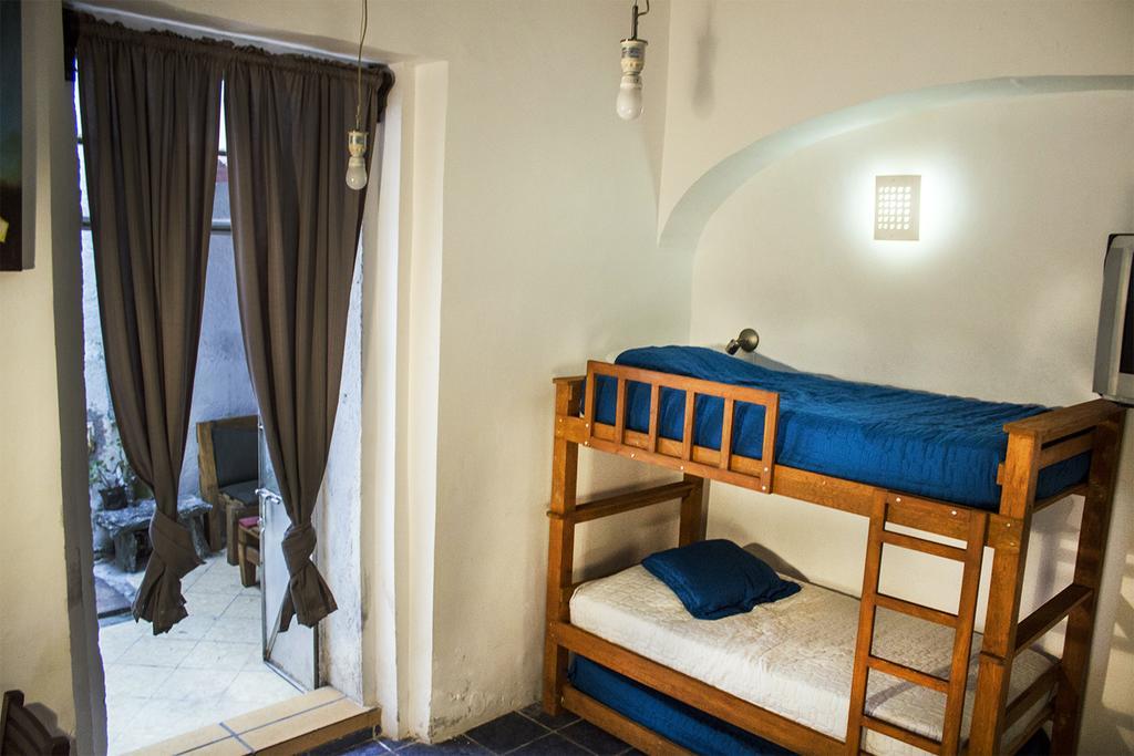 Gente De Mas Hostel Πουέμπλα Δωμάτιο φωτογραφία